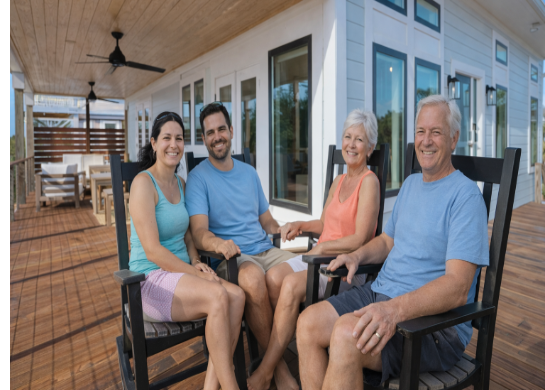 breathtaking oceanfront sunset, awe-inspiring beauty, casting long shadows, photorealistic, panoramic view of the ocean meeting the horizon, highly detailed, vibrant clouds with pink and orange hues, ISO 100, soft twilight glow, low-light evening setting, shot with a 50mm prime lens.